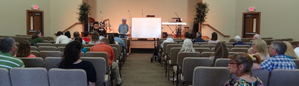 Associate Pastor Reuben Sairs teaching an Adult Discipleship Class.